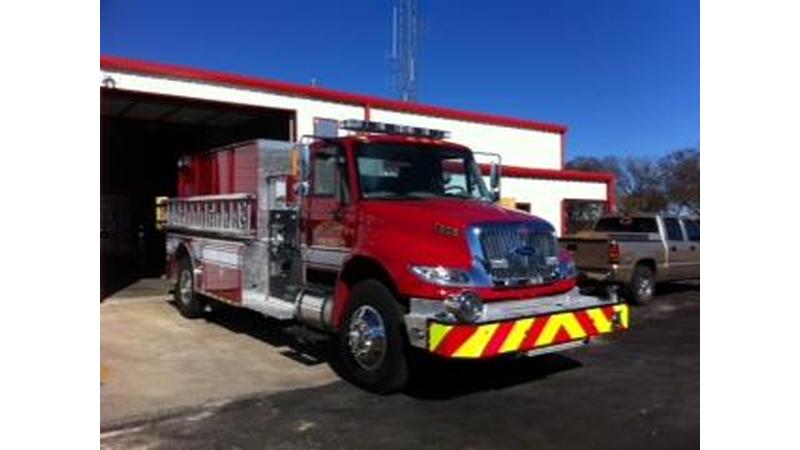 fire engine in front of volunteer fire department