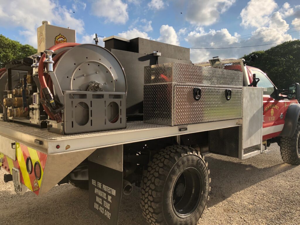 The back of a firetruck that has been equipped with a new donated foam tank