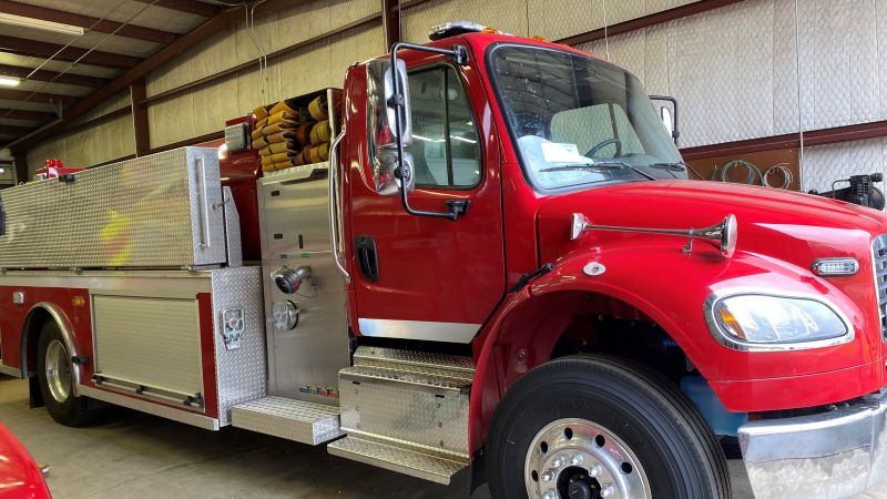 New Cat Spring Fire Truck shown from side