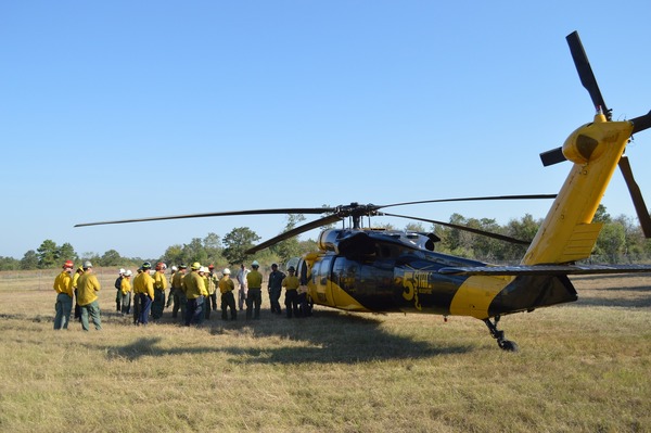 A training taking place next to an emergency response helicopter