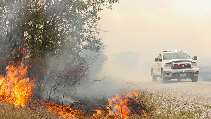 A VFD truck arrives on scene of a wildfire